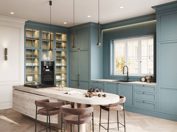 Muted blue painted cabinets with a smooth satin finish and warm white walls by a house painter in Howard County, MD.