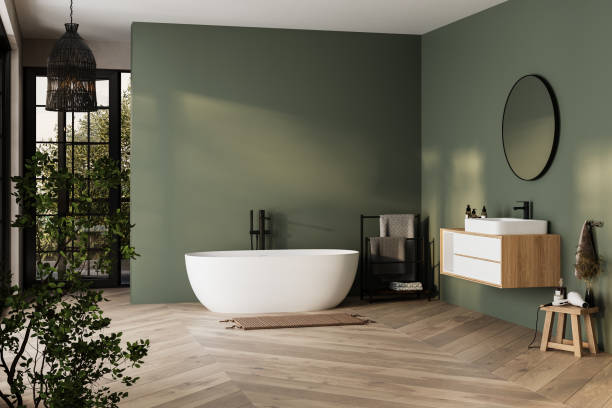 Modern bathroom with soft sage green walls and crisp white trim by an interior painter in Randallstown, MD.