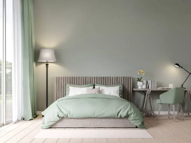 Bedroom with soft sage green walls with a matte paint finish by a house painter in Carroll County, MD.